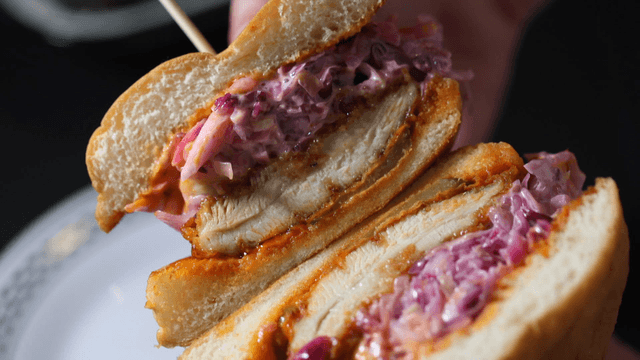 Chicken burger cross-section with red cabbage