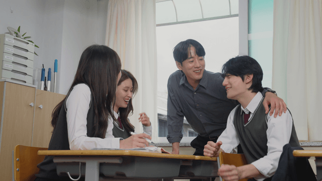 Teacher and students chatting together