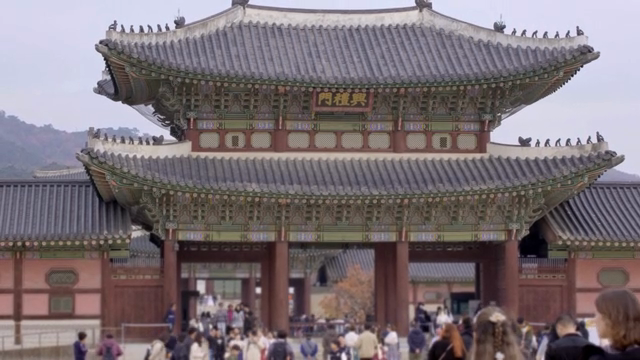 Traditional Korean palace with many visitors
