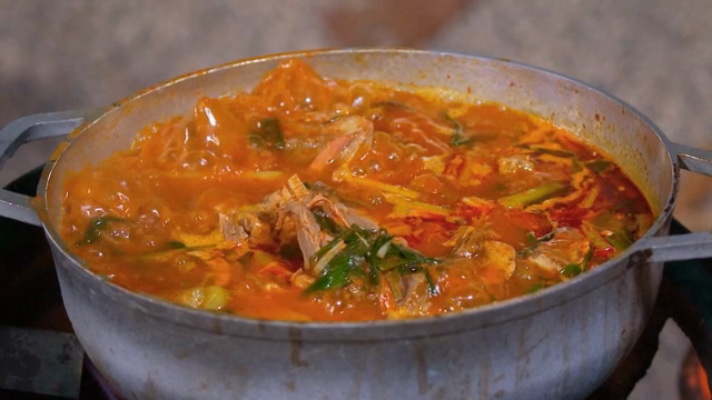 A pot of spicy stew boiling