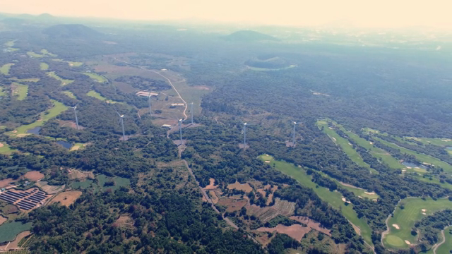 Expansive landscape with wind turbines