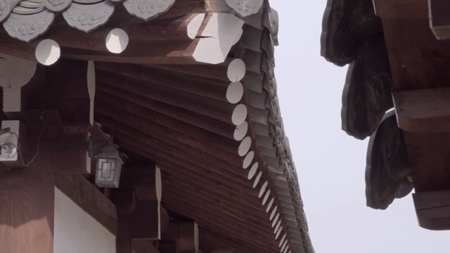 Traditional Korean roof with wooden beams
