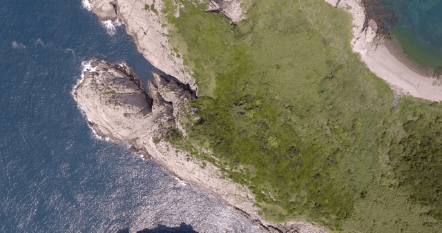 Rocky coastline with clear blue sea
