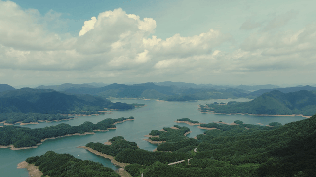 Scenic view of a lake surrounded by mountains