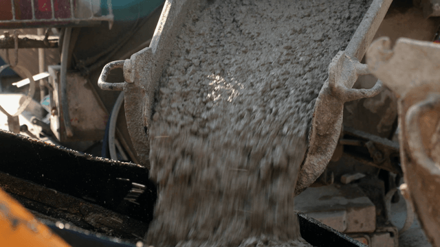 Concrete pouring from a mixer