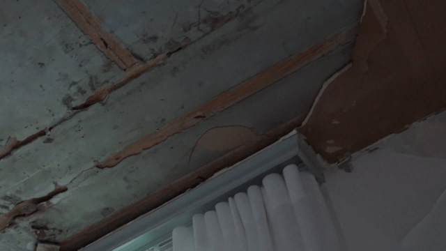 Exposed ceiling with visible damage