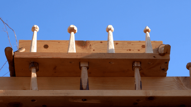 Handcrafted wooden shelf under the blue sky