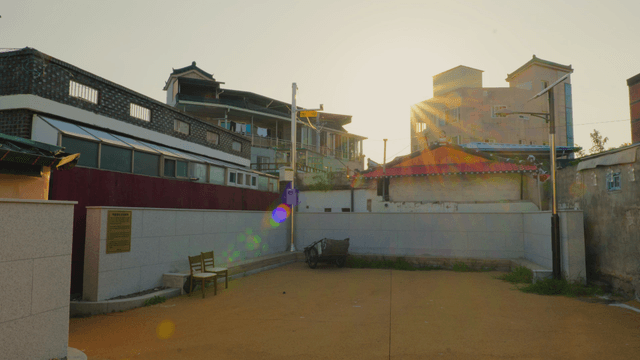 Sunlight over a quiet neighborhood alley