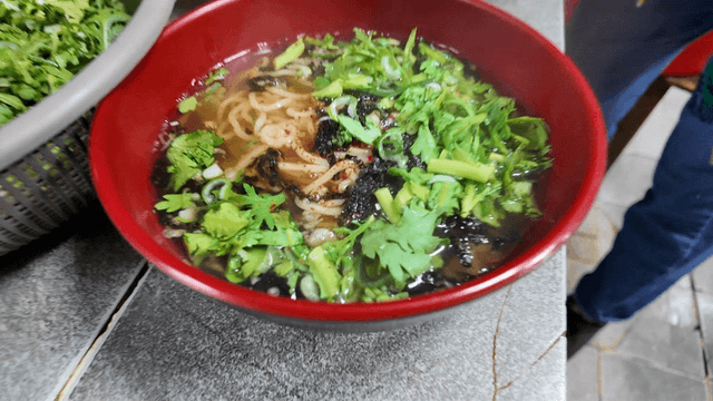 Hot udon bowl with fresh mugwort