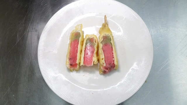 Watermelon-shaped ice cream coated in batter and fried