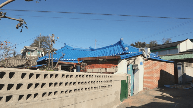 Traditional Korean house with blue roof