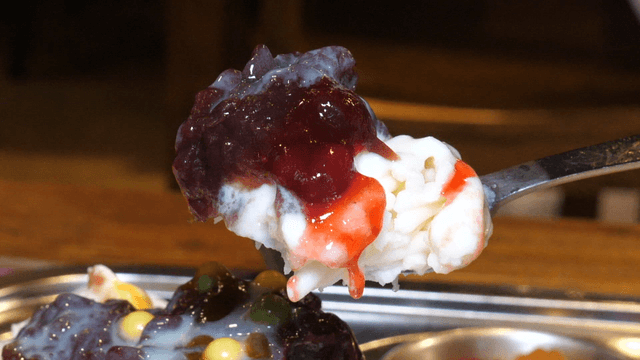 A spoonful of colorful Korean dessert