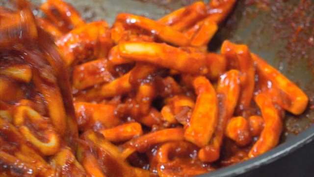 Stir-fried spicy squid in a pan