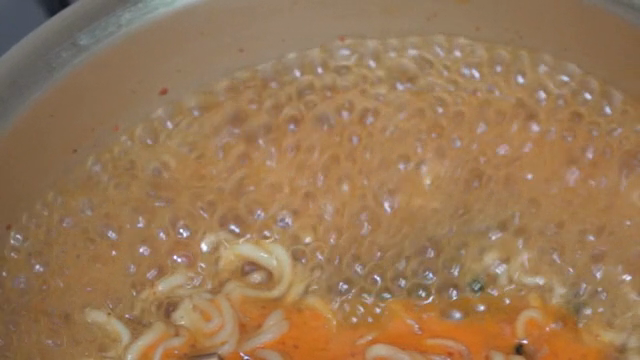 Ramen boiling in a pot