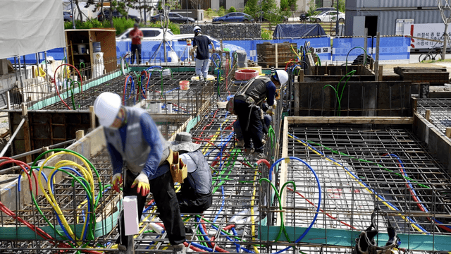 Construction workers at a building site