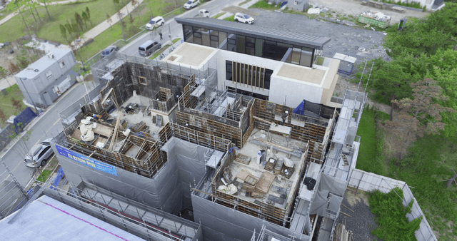 Construction site with scaffolding and workers