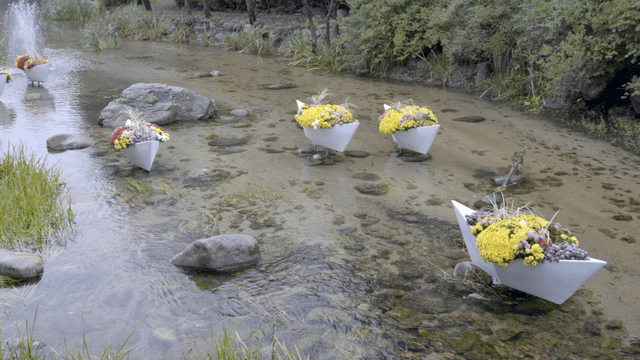Floral decoration floating on a gentle stream