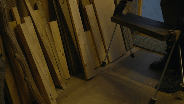 Wooden boards and bench in the workshop