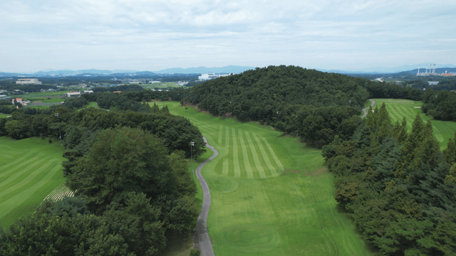 Aerial view of a lush green golf course