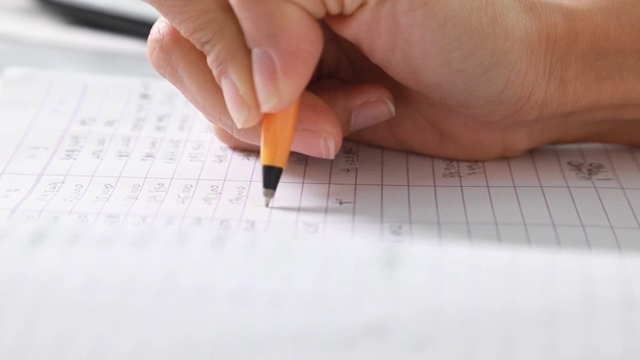 Hand writing on a financial document