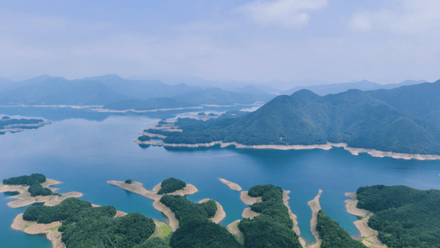 Vast lake surrounded by lush mountains