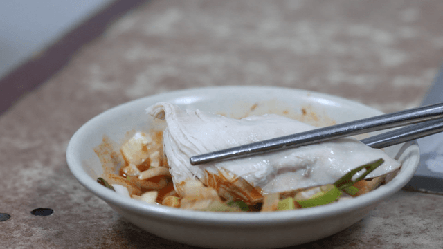 Chicken dipped in spicy sauce