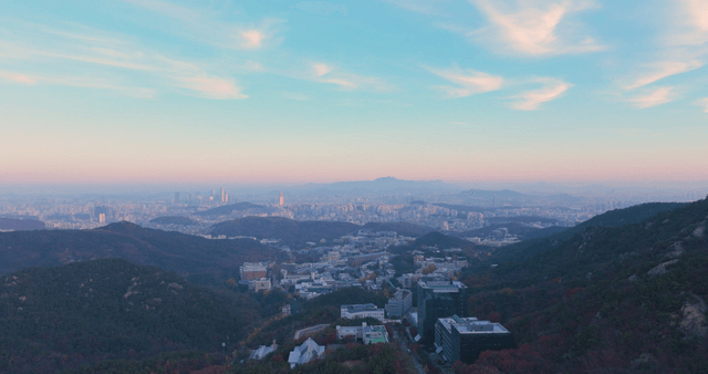 Cityscape with mountains at dawn