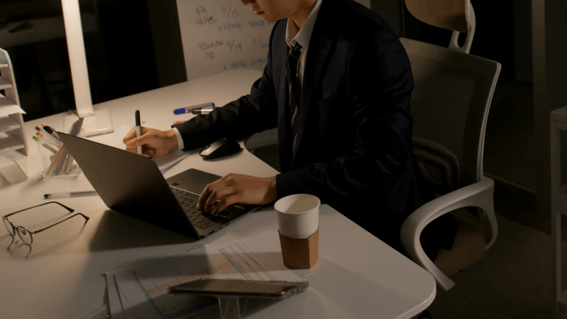 Person working late at a desk