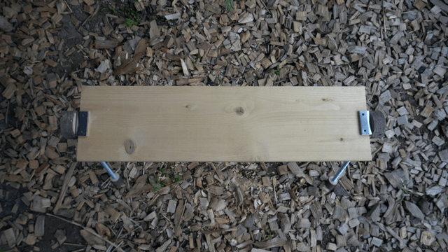 Handcrafted wooden bench placed on woodcraft pieces
