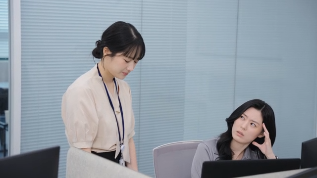 An employee being scolded by their boss after a report
