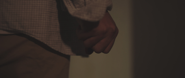 Hand clutching bills