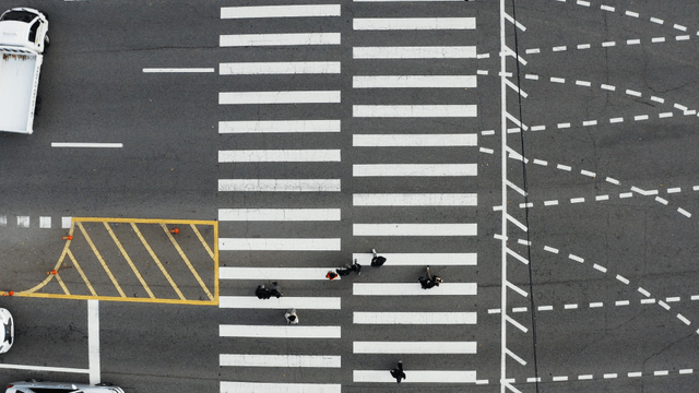 People crossing a crosswalk