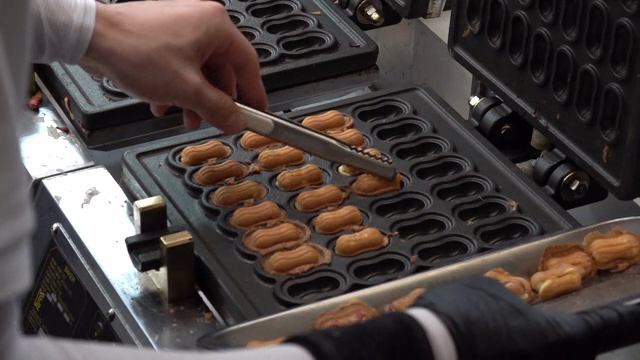 Freshly baked peanut-shaped bread