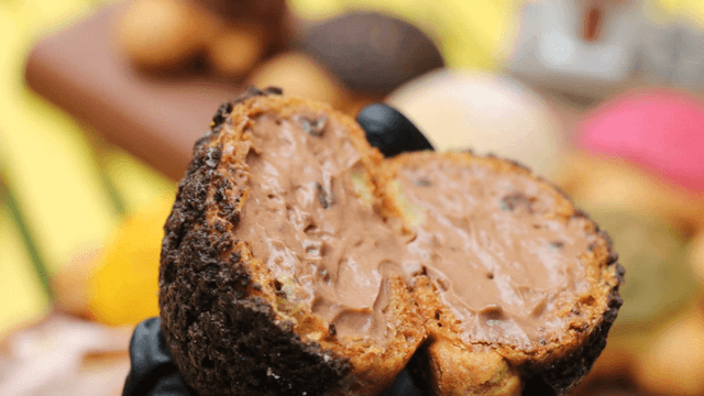 Splitting cream-filled bread by hand