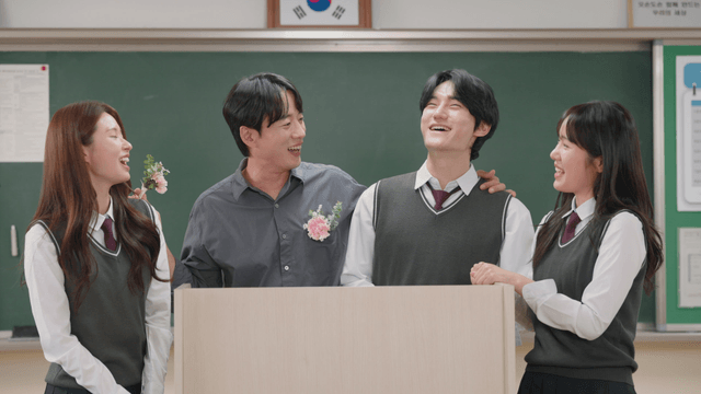 Students giving flowers to their teacher on Teacher’s Day