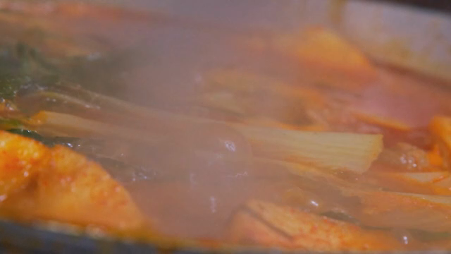 A pot of spicy stew boiling
