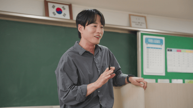 Teacher giving a lecture in a classroom