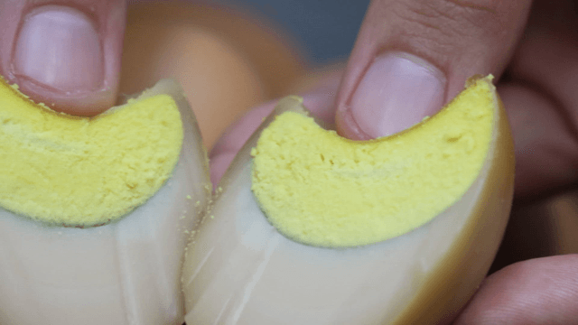 Halved baked maekbanseok egg showing cut surface