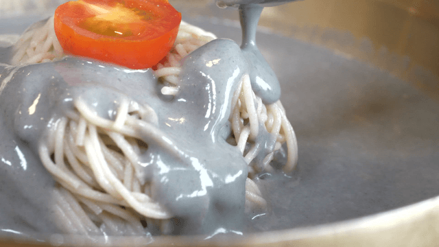 Cherry tomato on black bean buckwheat noodles