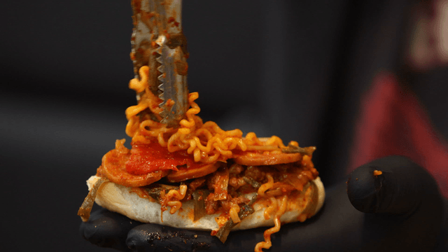 Budaejjigae sandwich topped with kimchi and ramen