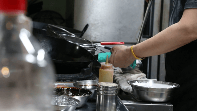 Chef preparing ingredients in a kitchen