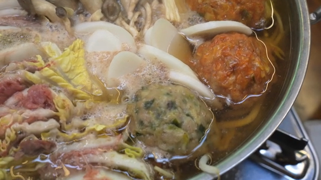 A pot of Korean hot pot with various ingredients