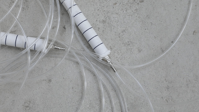 Coiled tubes on a concrete surface