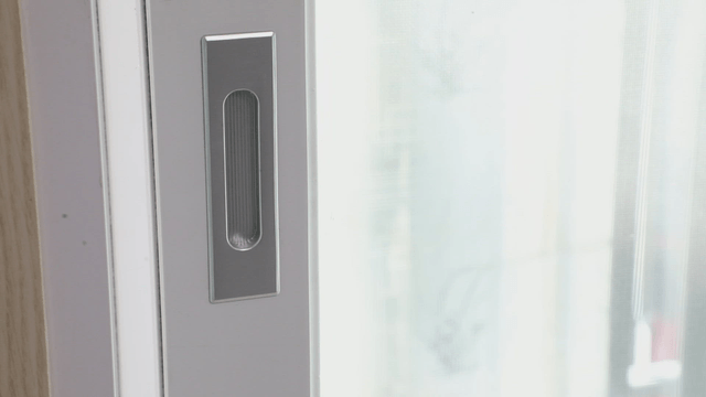 Close-up of a sliding door handle