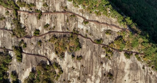 A scenic mountain with a winding path