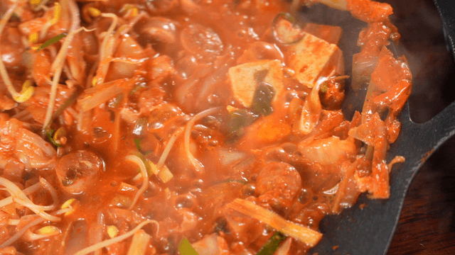 Boiling budaejjigae  overflowing from pot