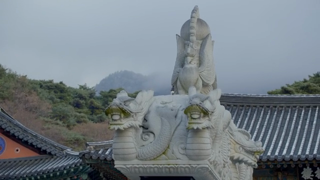 Traditional Korean temple with dragon statue
