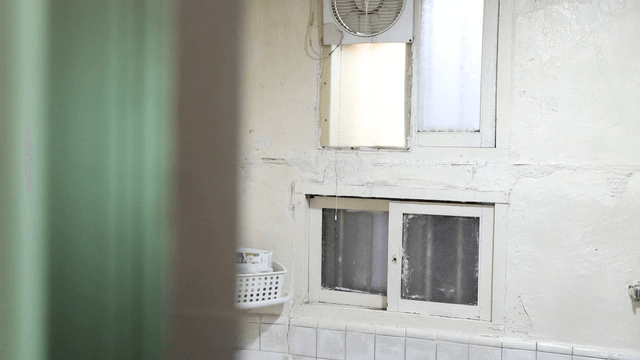 Old bathroom with a small window