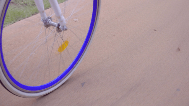Bicycle wheel moving on a path