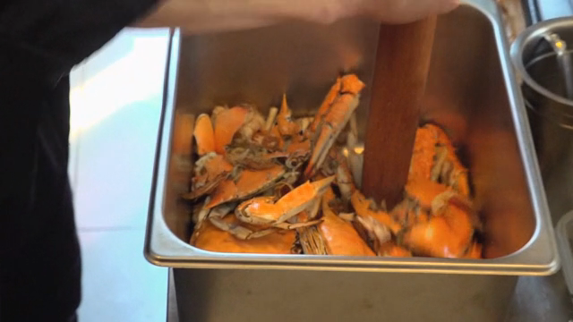 Crushing crabs in a kitchen setting